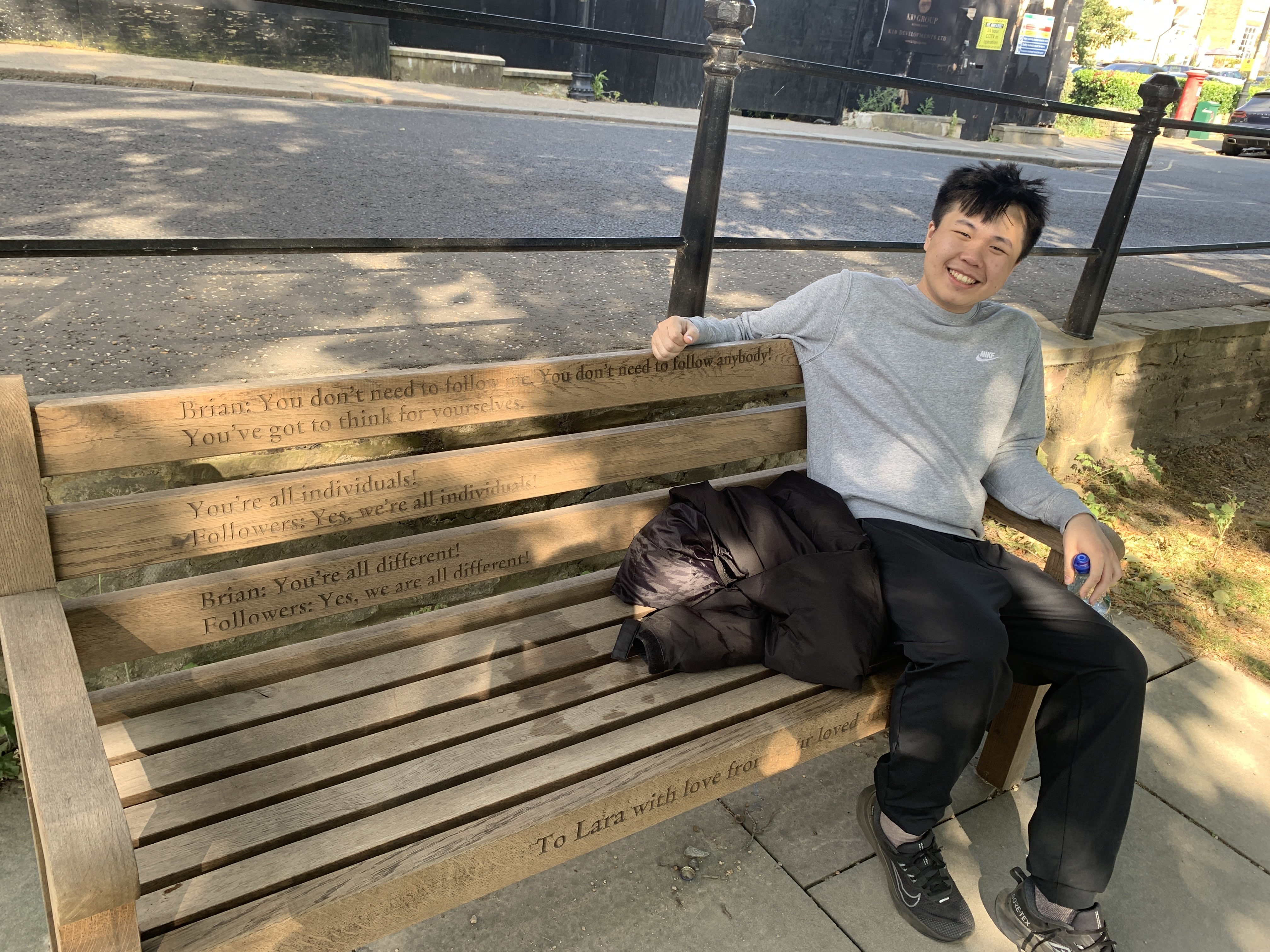 Brian Lee sitting on a bench in Richmond